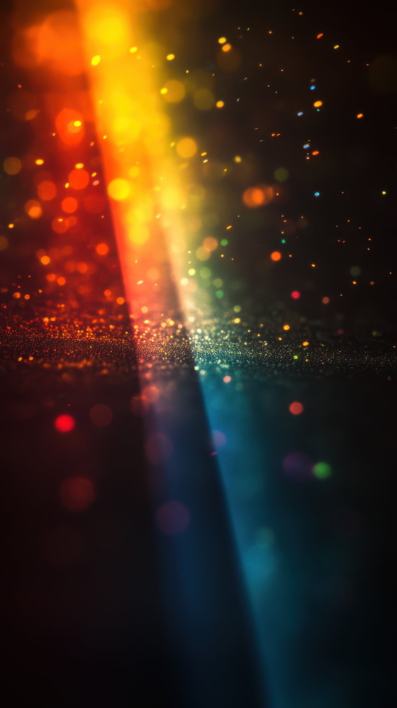Colorful bokeh lights create a mesmerizing effect in a dark environment at night